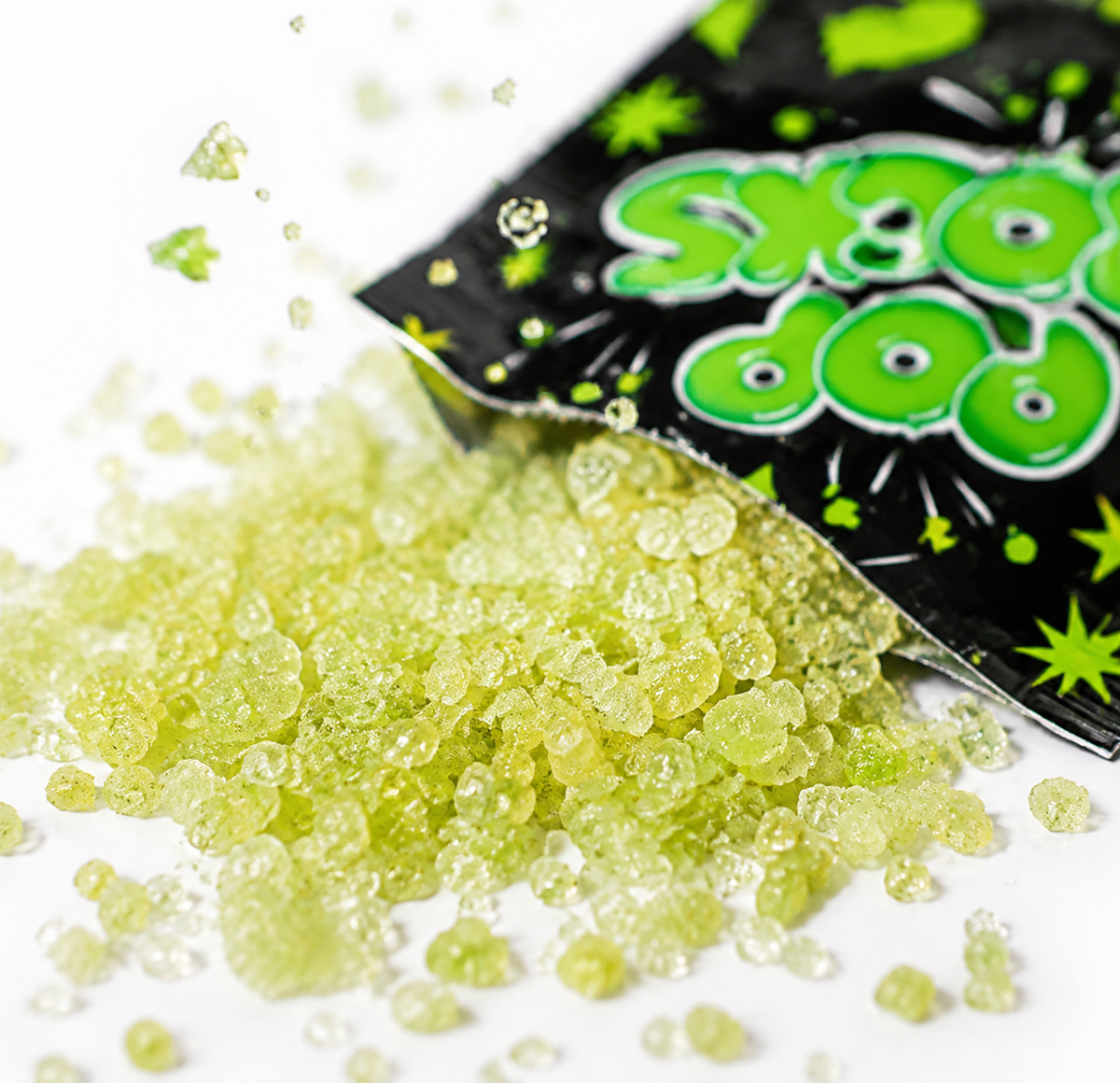 Green apple Pop Rocks poured from the packet