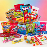 Assorted wrapped candy mix poured out of the bag