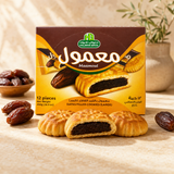 Date filled cookies stacked on a plate
