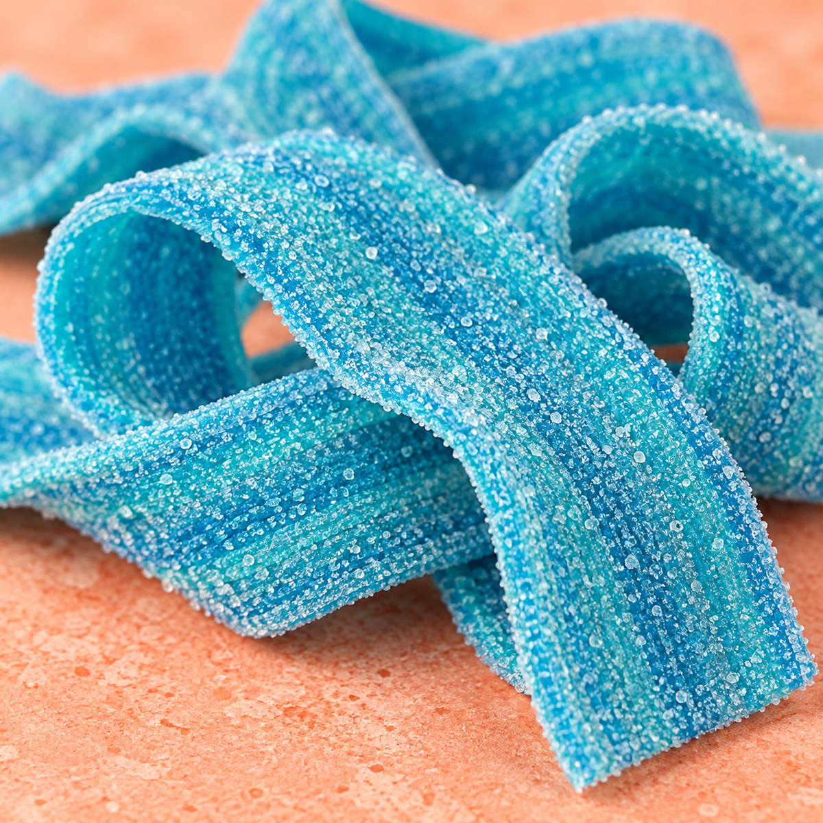 Blue Raspberry Sour Belts sold by the pound at Avaza Candy, blue raspberry sour belt candy