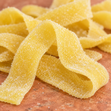 Mango Sour Belts sold by the pound at Avaza Candy, mango sour belt candy