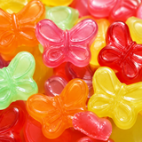 Colorful gummy butterflies candy in six fruit flavors