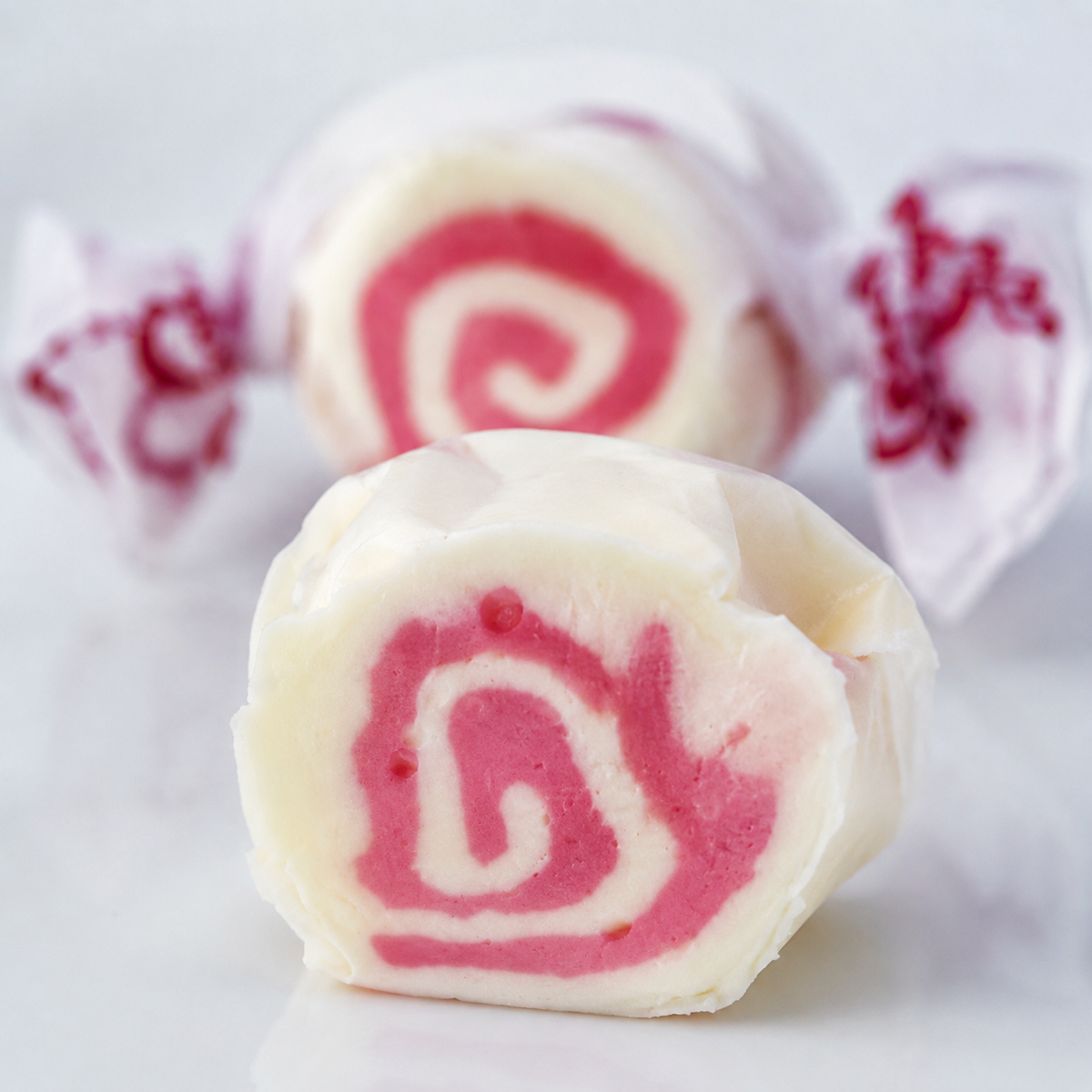 Strawberry Cheesecake salt water taffy, individually wrapped pieces