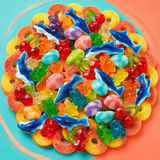 Mega gummy candy salad mix with peach rings, bears, sharks and sour worms