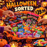 Wrapped Halloween chocolates and sour gummies