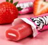 Cow Tales stick cut to show the strawberry cream centre