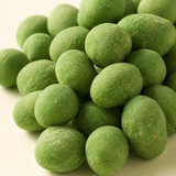 Close-up of wasabi peanuts showing the coating